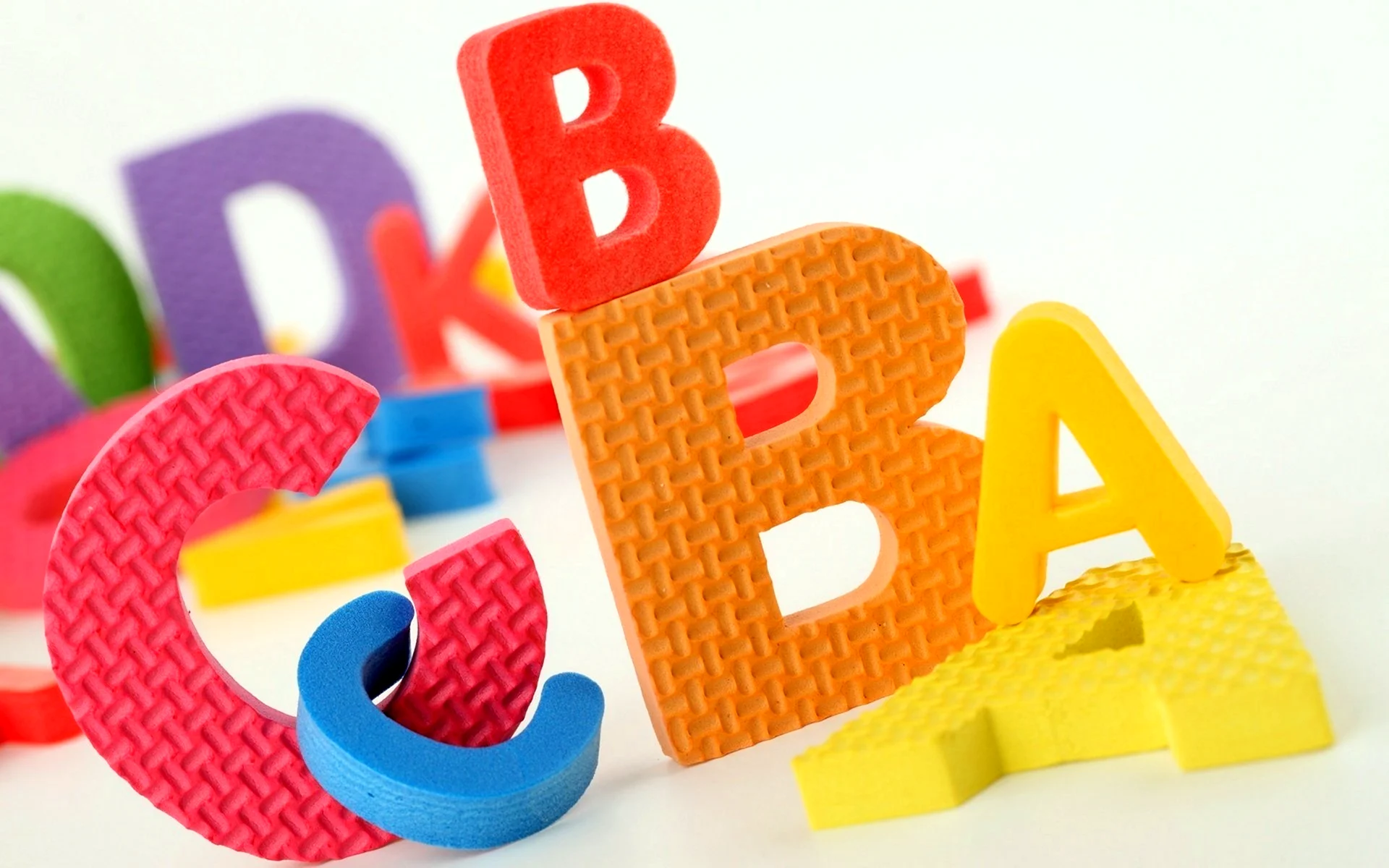 Буквы в игрушках