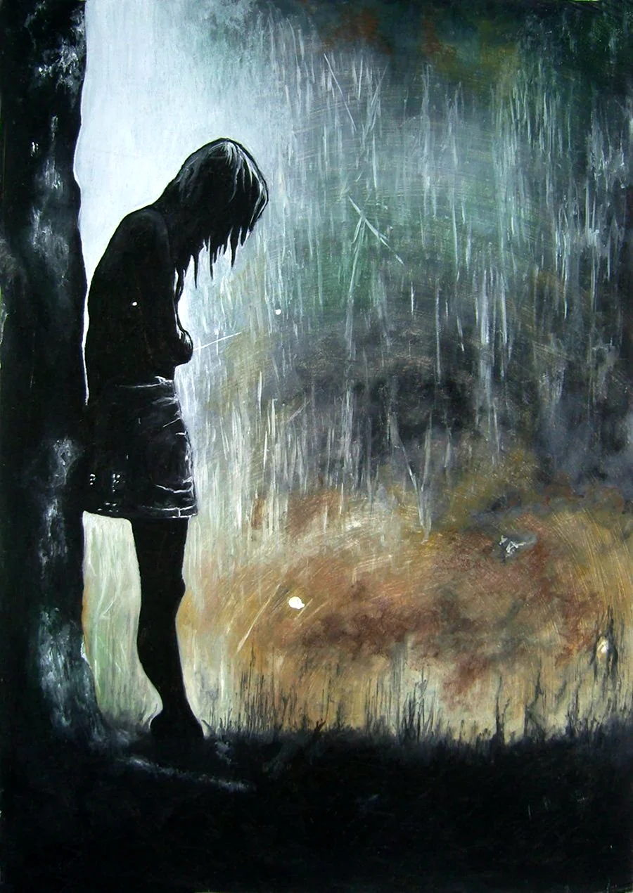Одинокая девушка под дождем