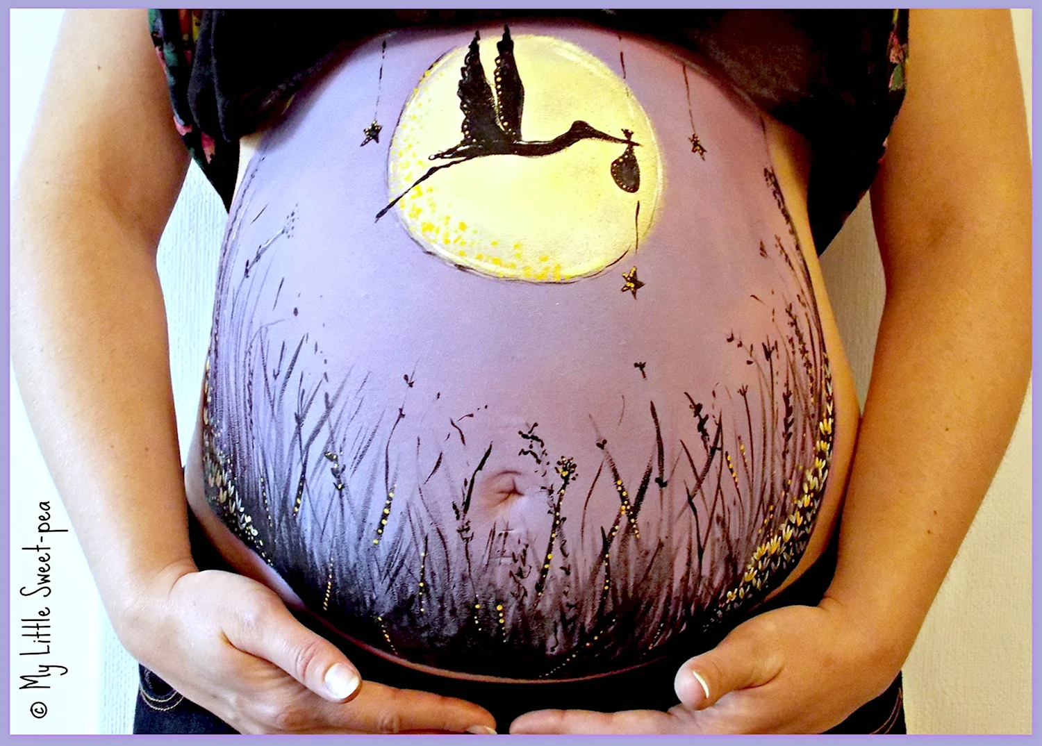 Рисование на животе беременных